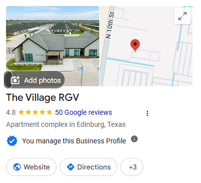 Exterior view of The Village RGV building with a nearby map showing its location in Edinburg, Texas.