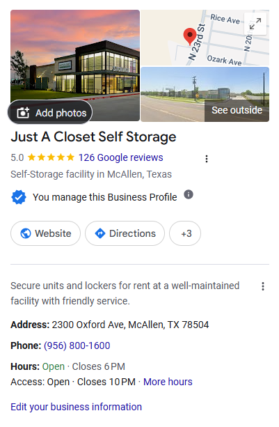 Exterior view of Just A Closet Self Storage building at sunset with warm sky behind glass storefronts (informative image) ðŸ”®️